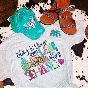 Women’s graphic tee “stay in your own lane”